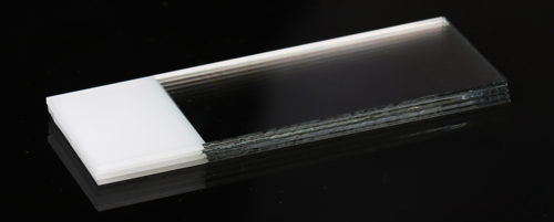 Microslides, Basic, cut edges, one end, one side color coat white, soda lime